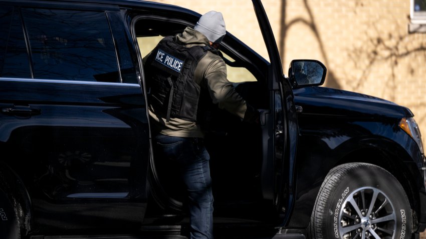 A US Immigration and Customs Enforcement (ICE) agent enters a vehicle during a multi-agency targeted enforcement operation in Chicago, Illinois, US, on Sunday, Jan. 26, 2025. President Donald Trump has pledged to carry out the largest deportation effort in US history, vowing to ultimately deport all of the foreigners living in the country without permission. Photographer: Christopher Dilts/Bloomberg via Getty Images